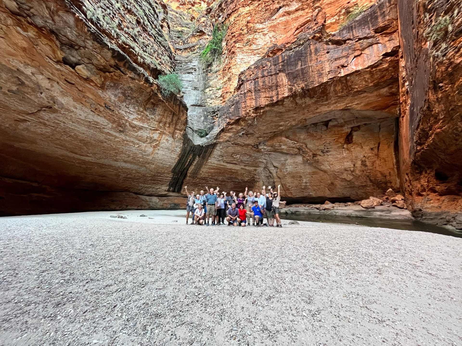 Tour group celebrating inside Cathedral Gorge, Purnululu
